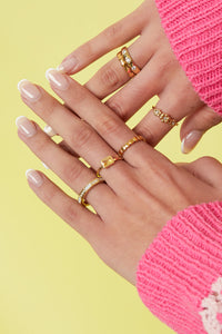 Hoekige ring met steentjes en parelmoer detail