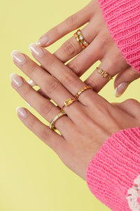 Hoekige ring met steentjes en parelmoer detail