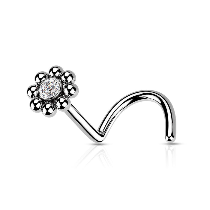 Zilverkleurige neuspiercing met kristal in het midden en stalen bolletjes rondom van chirurgisch staal, geschikt voor de neus.